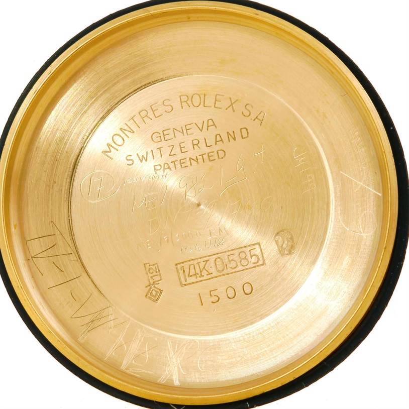 This image shows the inside case back of a Rolex President 1500 Men
s Yellow Gold Champagne Dial 1500 Men
s Yellow Gold Champagne Dial model watch, featuring hallmark engravings and model numbers.