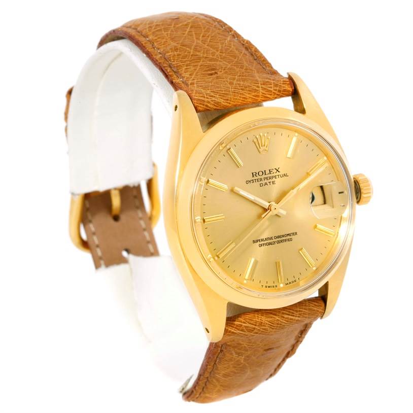The image shows a Rolex President 1500 Men
s Yellow Gold Champagne Dial 1500 Men
s Yellow Gold Champagne Dial model watch at an angled side view, highlighting its gold case, dial, and brown leather strap.