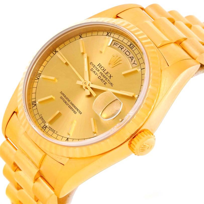 This image shows an angled close-up of a Rolex President 18238 Men
s Yellow Gold Champagne Dial 18238 Men
s Yellow Gold Champagne Dial model watch with its gold dial, day-date display, and fluted bezel.
