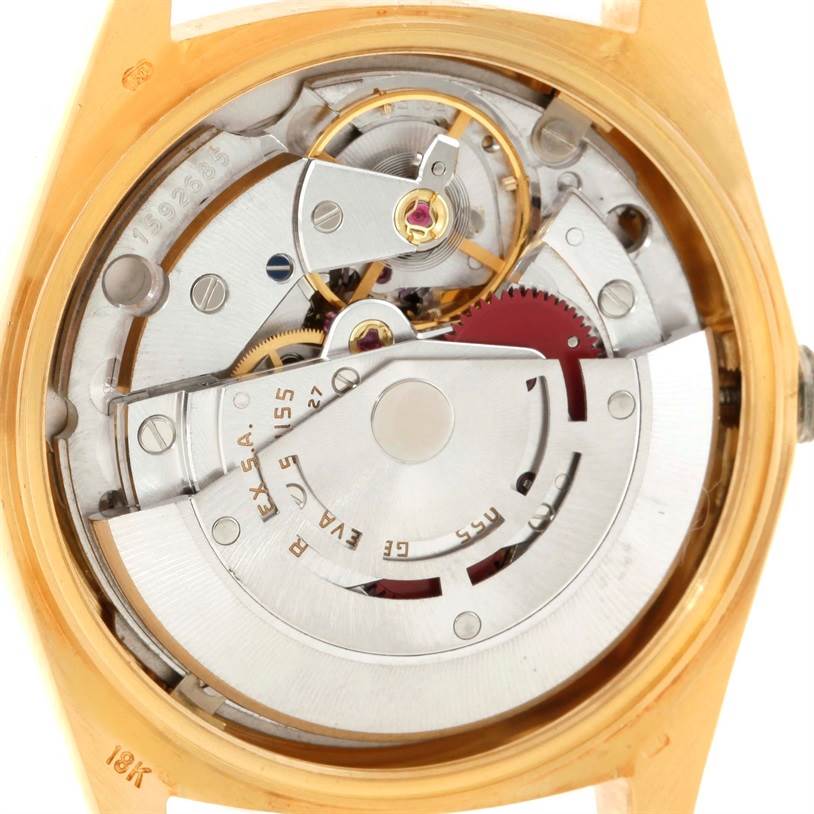 This image shows the internal mechanical movement of a Rolex President 18038 Men
s Yellow Gold Champagne Dial 18038 Men
s Yellow Gold Champagne Dial model watch viewed from the back.