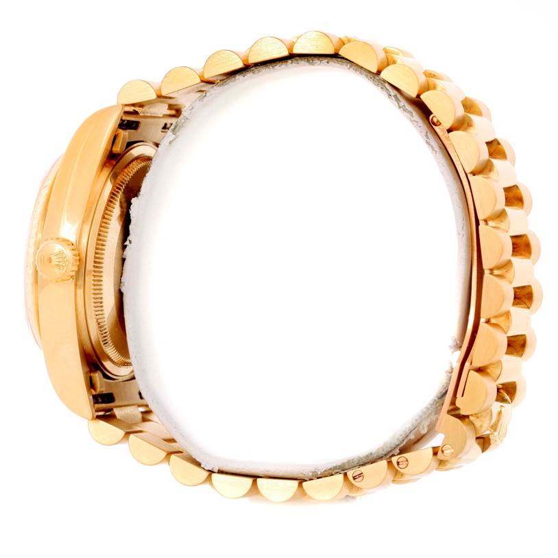 This image shows a side view of the Rolex President 18038 Men
s Yellow Gold Champagne Dial 18038 Men
s Yellow Gold Champagne Dial model watch, highlighting the crown and bracelet.