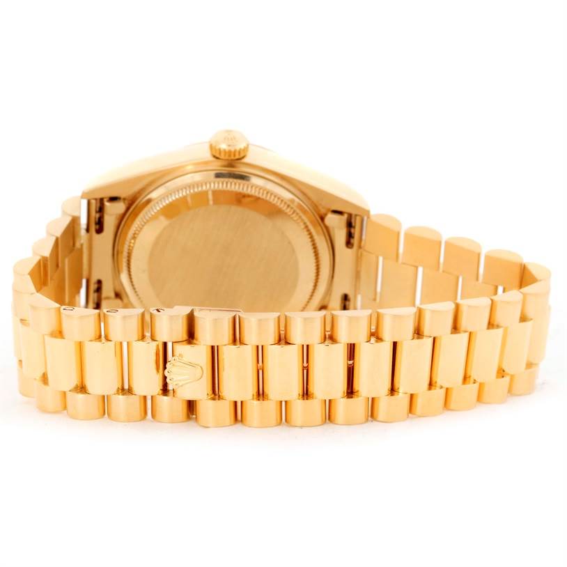 The image shows the back case and bracelet of a Rolex President 18038 Men
s Yellow Gold Champagne Dial 18038 Men
s Yellow Gold Champagne Dial model watch at a rear angle.