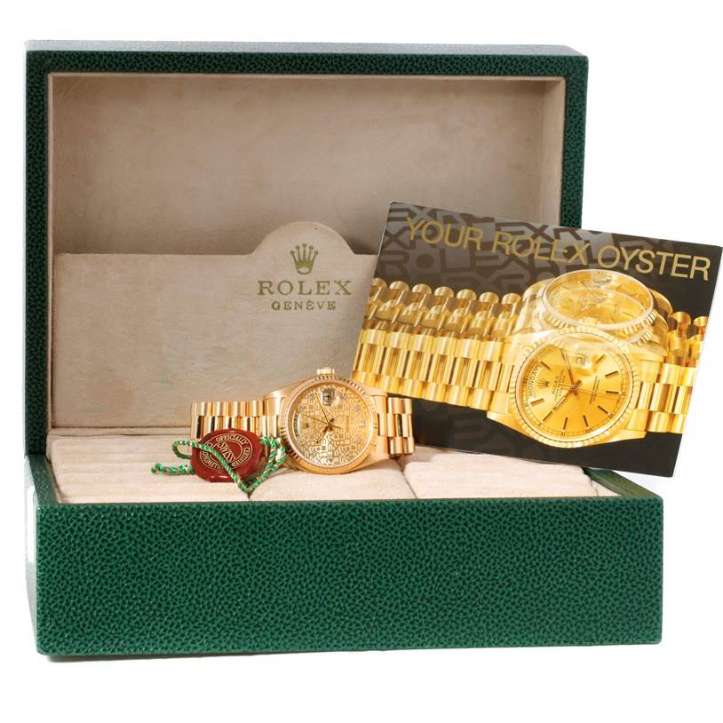 The image shows a Rolex President 18038 Men
s Yellow Gold Champagne Dial 18038 Men
s Yellow Gold Champagne Dial model watch with its box and accessories, including a tag and booklet.