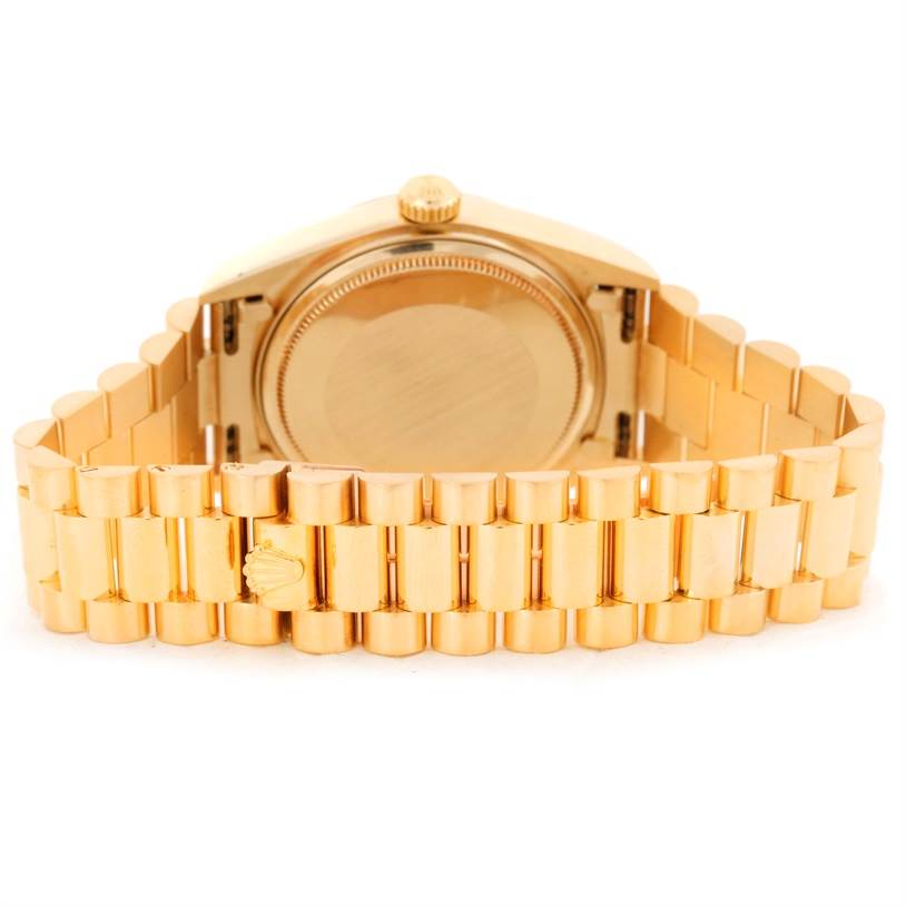 This image shows the back view of a Rolex President 18038 Men
s Yellow Gold Champagne Dial 18038 Men
s Yellow Gold Champagne Dial model watch, highlighting the case back and bracelet.