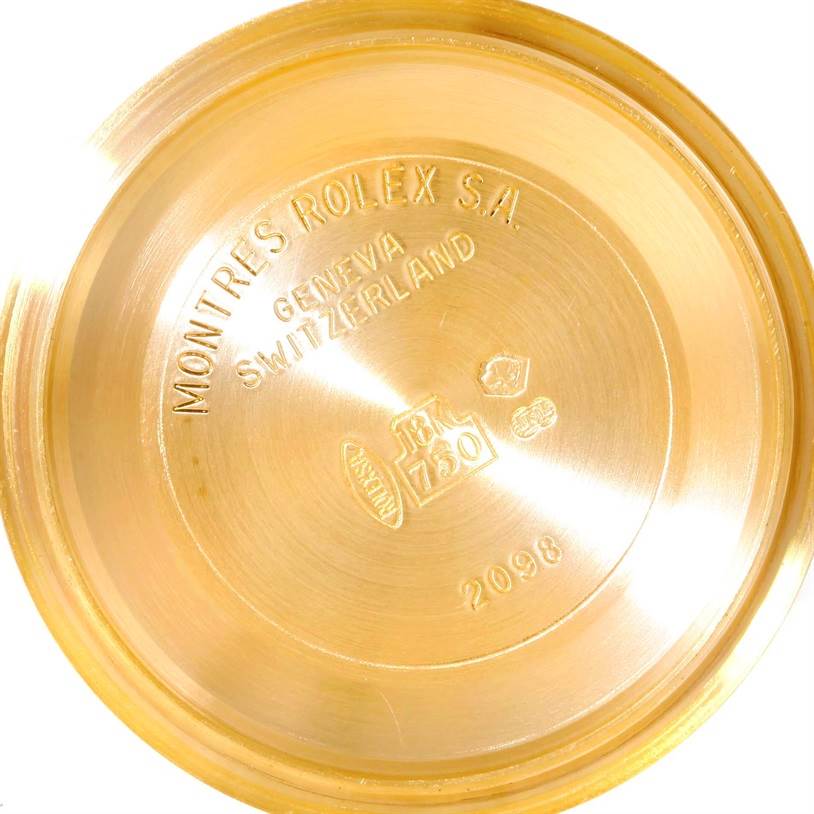 The image shows the inside case back of a Rolex President 118238 Men
s Yellow Gold White Dial 118238 Men
s Yellow Gold White Dial model watch, showcasing engravings and hallmarks.