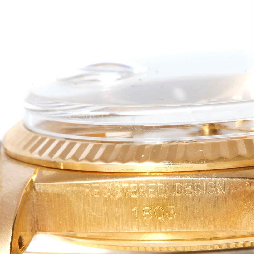 This close-up side view of a Rolex President 1803 Men
s Yellow Gold Champagne Dial 1803 Men
s Yellow Gold Champagne Dial model 1803 shows the case, bezel, and crystal.