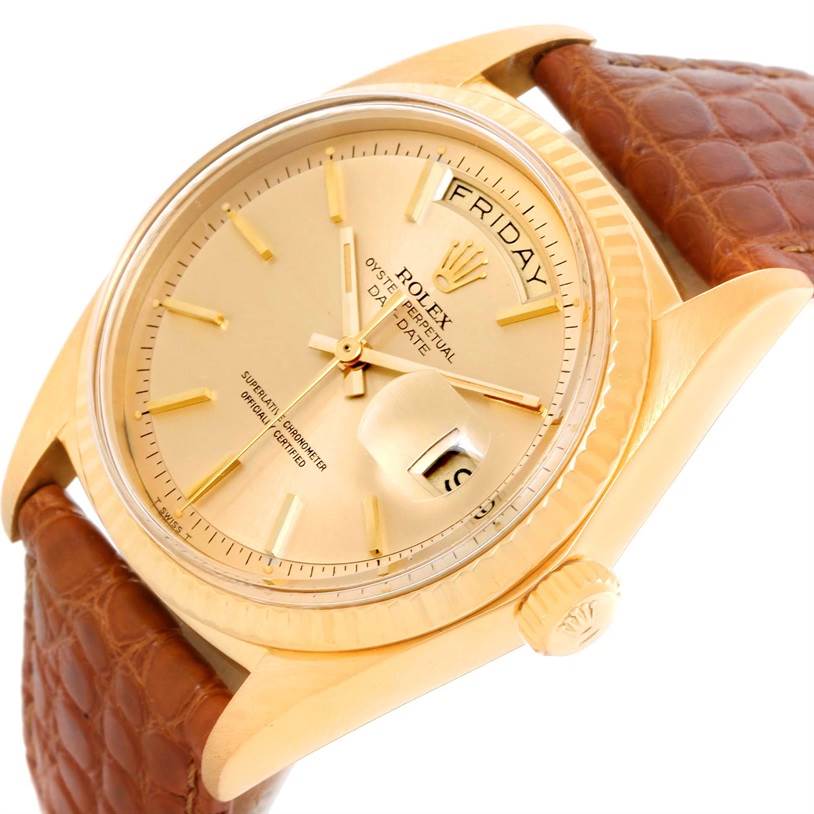 The image shows the Rolex President 1803 Men
s Yellow Gold Champagne Dial 1803 Men
s Yellow Gold Champagne Dial model watch at an angled view focusing on the dial, crown, and part of the brown leather strap.