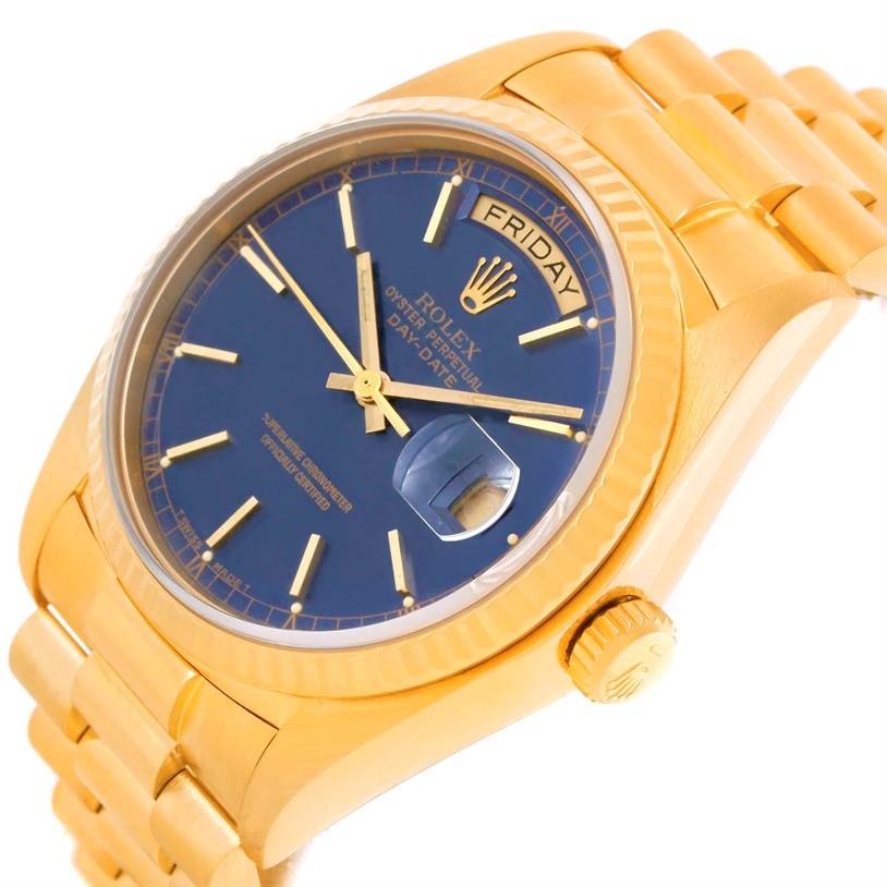 This image shows a Rolex President 18038 Men's Yellow Gold Blue Dial 18038 Men's Yellow Gold Blue Dial model watch from a side angle, detailing the blue dial, day/date display, bezel, and bracelet.