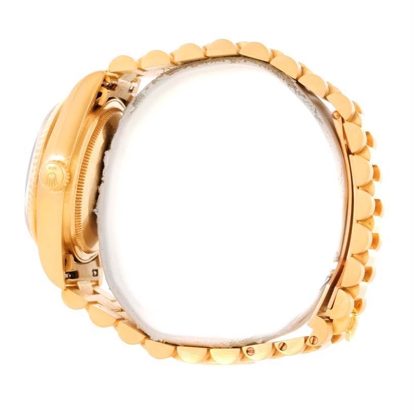 The image shows a side profile of a Rolex President 18038 Men's Yellow Gold Blue Dial 18038 Men's Yellow Gold Blue Dial model watch, highlighting the case, crown, and part of the bracelet.