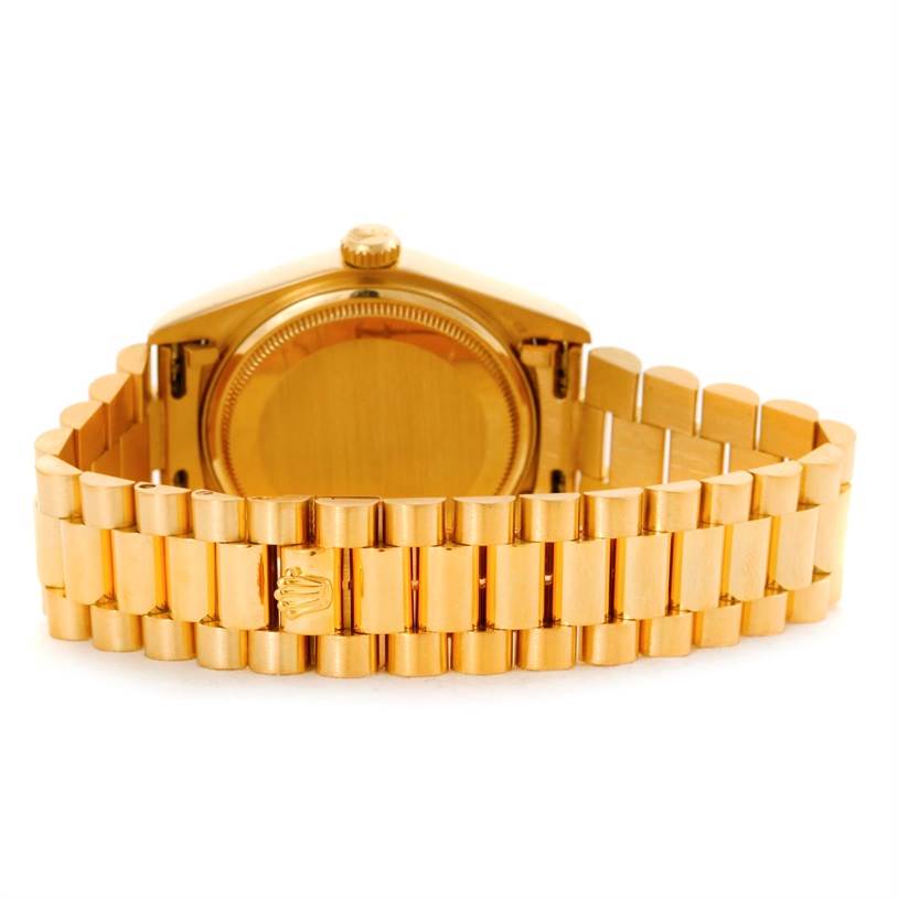 The image shows the back side and bracelet of a Rolex President 18038 Men's Yellow Gold Blue Dial 18038 Men's Yellow Gold Blue Dial model watch.