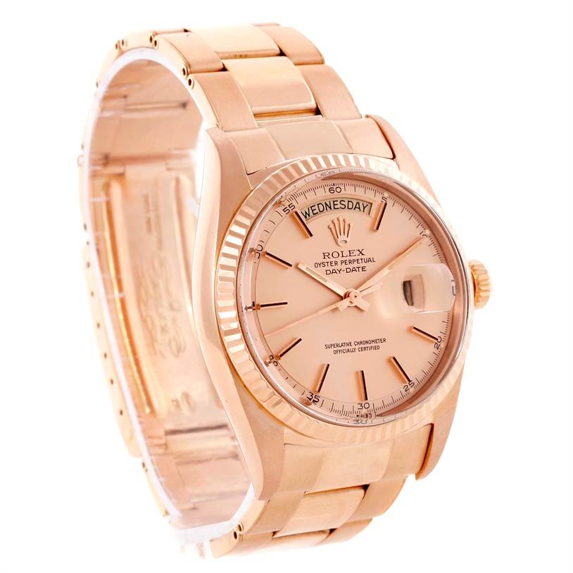This Rolex President 1803 Men's Rose Gold Pink Dial 1803 Men's Rose Gold Pink Dial model watch shows a side and front angle, highlighting the band, watch face, and crown.
