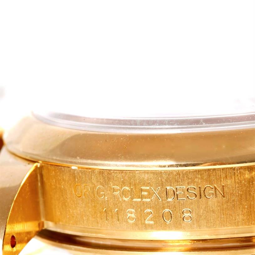 This close-up image shows the side of a Rolex President 118208 Men's Yellow Gold Black Dial 118208 Men's Yellow Gold Black Dial model, highlighting the engraved model number "118208."