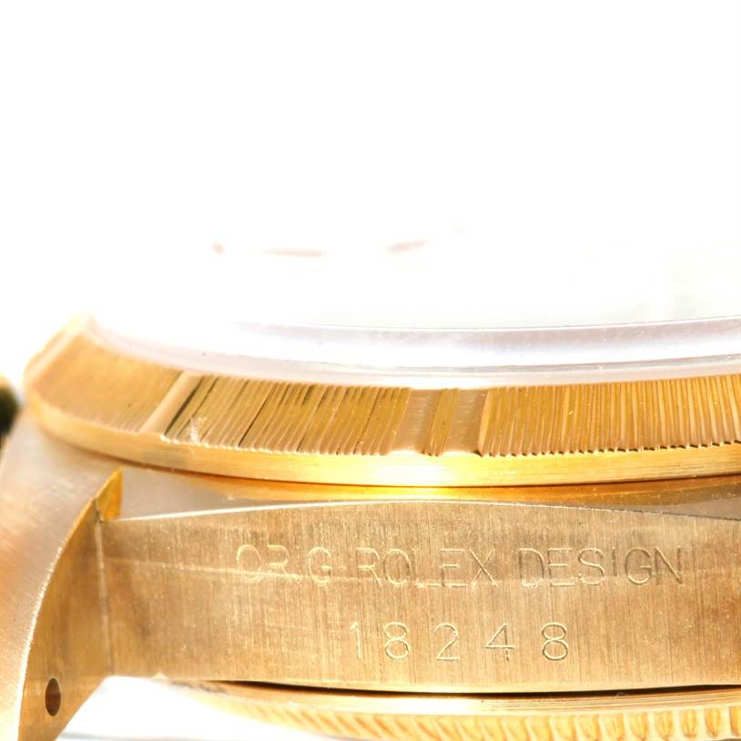The image shows a close-up of the side with model number engraving on a Rolex President 18248 Men
s Yellow Gold Champagne Dial 18248 Men
s Yellow Gold Champagne Dial watch.