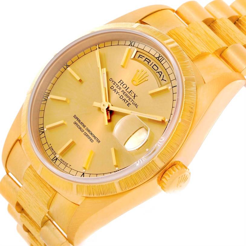 The image shows a close-up angle of a Rolex President 18248 Men
s Yellow Gold Champagne Dial 18248 Men
s Yellow Gold Champagne Dial model watch, highlighting the gold dial, day-date display, crown, and bracelet.