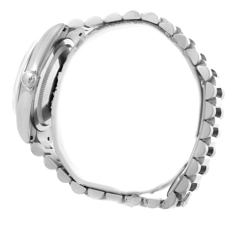 The image shows a side view of the Rolex President 118209 Men's White Gold Silver Dial 118209 Men's White Gold Silver Dial model watch, highlighting the crown, case, and bracelet.