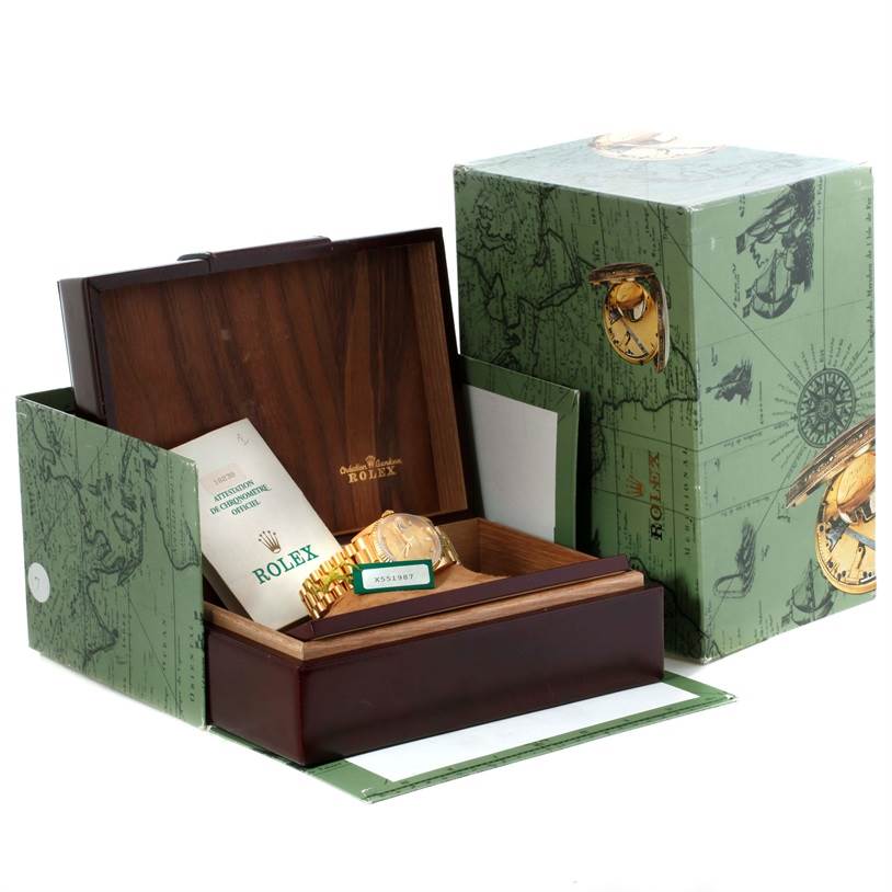 The image shows a Rolex President 18238 Men
s Yellow Gold Champagne Dial 18238 Men
s Yellow Gold Champagne Dial model watch and its box at an opened angle, including documentation and packaging.