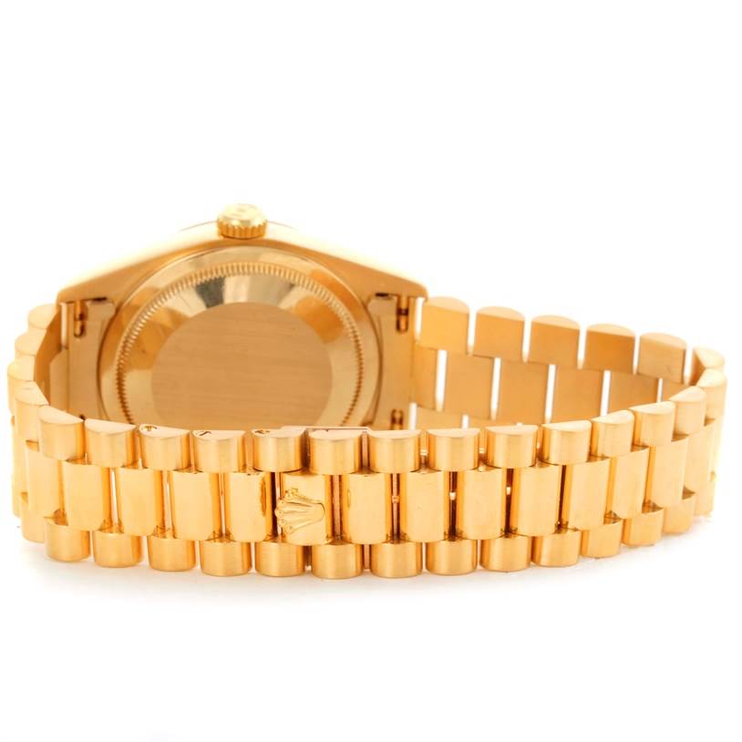 This image shows the back and bracelet of a Rolex President 18238 Men
s Yellow Gold Champagne Dial 18238 Men
s Yellow Gold Champagne Dial model watch.