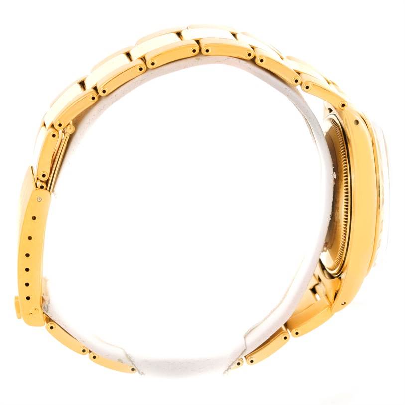 The image shows a side profile of a Rolex President 1500 Men
s Yellow Gold Champagne Dial 1500 Men
s Yellow Gold Champagne Dial model watch, highlighting the bracelet and part of the case.