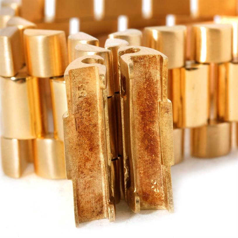 The image shows a close-up of the gold links from the bracelet of the Rolex President 1803 Men's  1803 Men's  model watch.