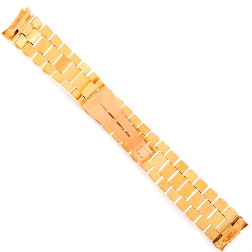 The image shows a gold bracelet for the Rolex President 1803 Men's  1803 Men's  model watch, taken from an overhead angle.