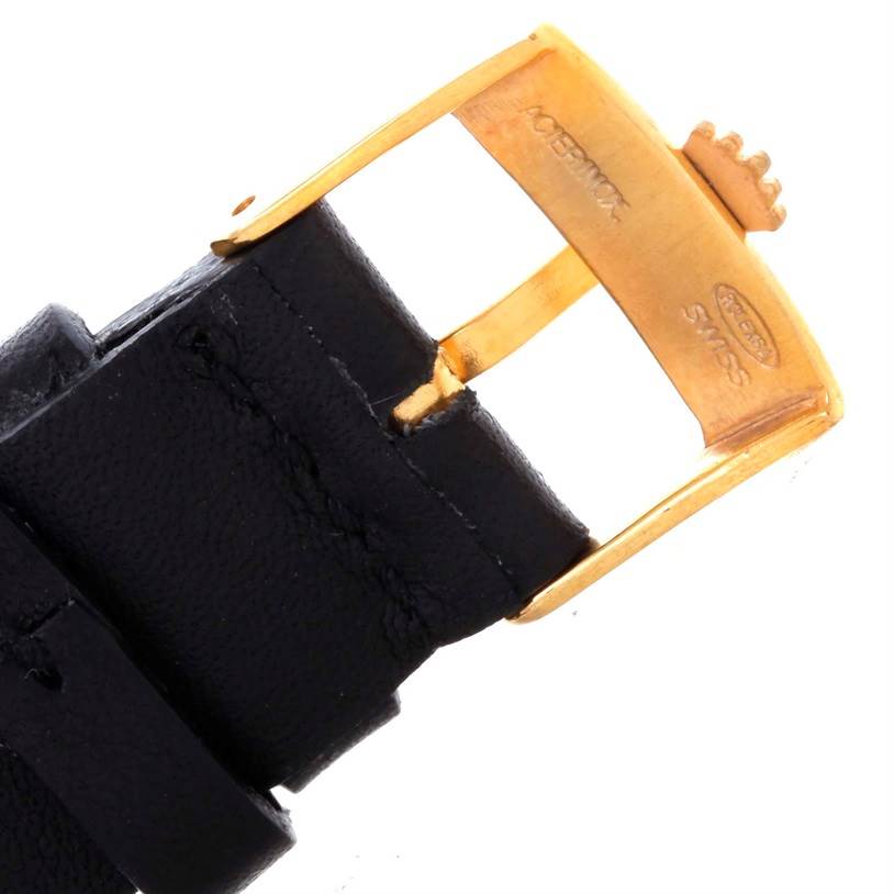 The image shows a close-up view of the gold buckle on a leather strap for the Rolex President 1803 Men
s Yellow Gold Champagne Dial 1803 Men
s Yellow Gold Champagne Dial model watch.