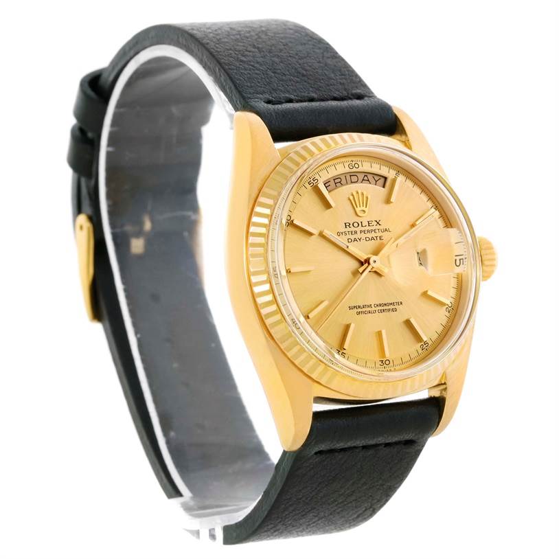 This image shows a Rolex President 1803 Men
s Yellow Gold Champagne Dial 1803 Men
s Yellow Gold Champagne Dial model watch at a side angle, highlighting its gold case, fluted bezel, and leather strap.