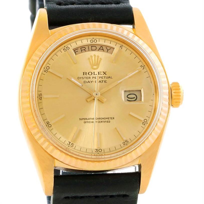 The image shows a frontal view of the Rolex President 1803 Men
s Yellow Gold Champagne Dial 1803 Men
s Yellow Gold Champagne Dial watch, highlighting its gold dial, day-date display, and black leather strap.