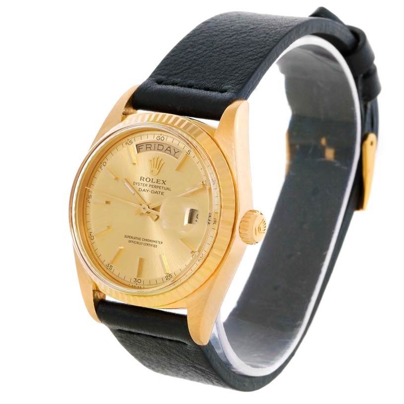 This image shows a side angle of the Rolex President 1803 Men
s Yellow Gold Champagne Dial 1803 Men
s Yellow Gold Champagne Dial model watch, highlighting its gold bezel, crown, and black leather strap.