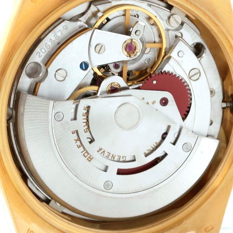 The image shows the internal movement mechanism of a Rolex President 18038 Men
s Yellow Gold Champagne Dial 18038 Men
s Yellow Gold Champagne Dial model watch from a close-up angle.