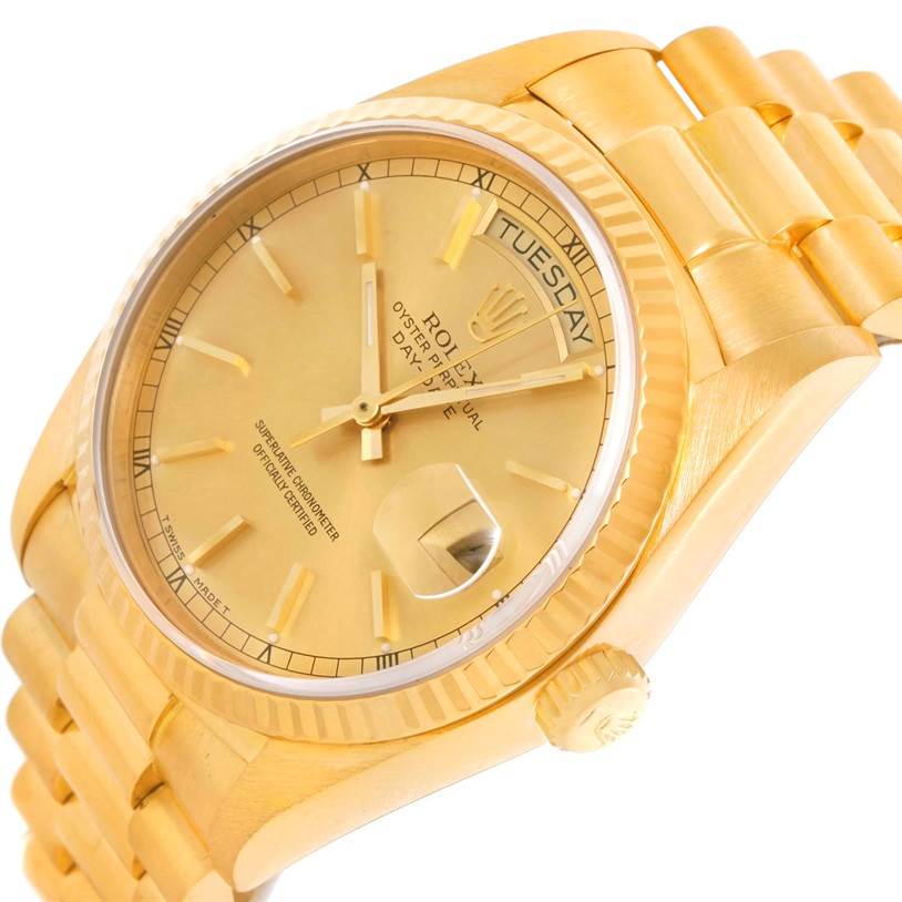 This image shows a close-up angled view of a Rolex President 18038 Men
s Yellow Gold Champagne Dial 18038 Men
s Yellow Gold Champagne Dial watch, highlighting the dial, bezel, and part of the bracelet.