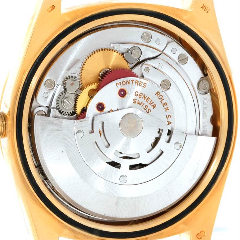 The image shows the inner mechanical movement of a Rolex President 18238 Men's Yellow Gold Beige Dial 18238 Men's Yellow Gold Beige Dial model watch, visible from the back.