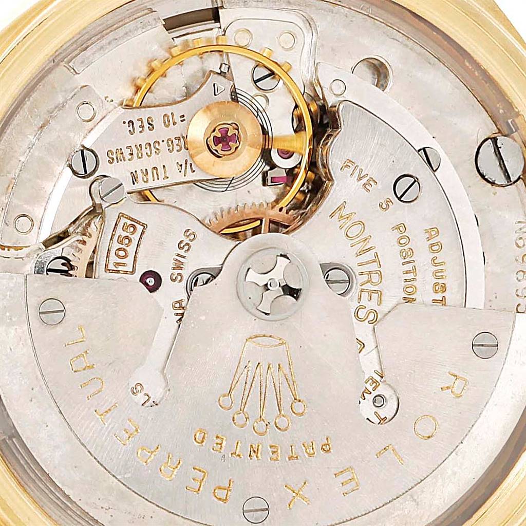 This image shows a close-up of the internal mechanism of the Rolex President 6611 Men's Yellow Gold Champagne Dial 6611 Men's Yellow Gold Champagne Dial model watch, highlighting its intricate movement components.