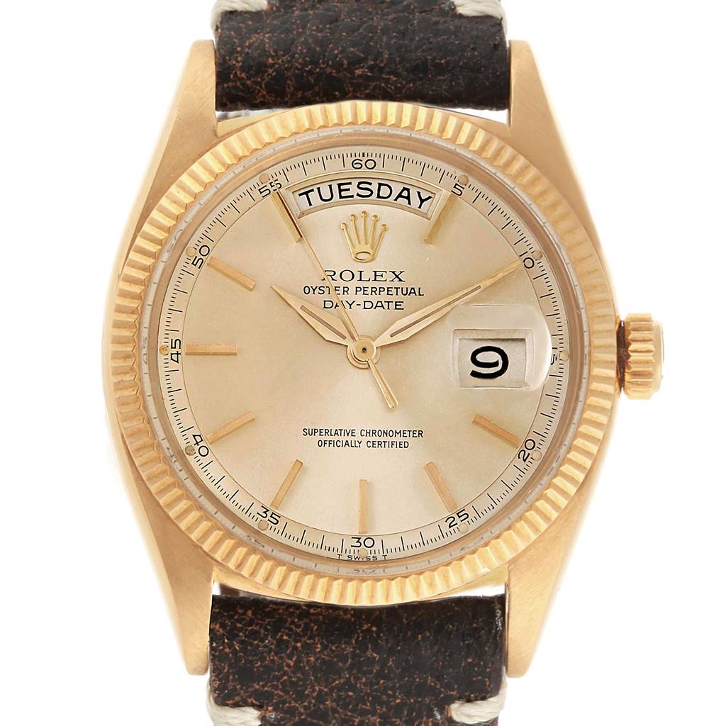 This image shows a frontal view of a Rolex President 6611 Men's Yellow Gold Champagne Dial 6611 Men's Yellow Gold Champagne Dial Day-Date watch, highlighting its face, bezel, crown, and leather strap.