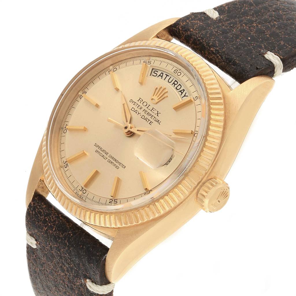 The image shows a close-up view of the Rolex President 6611 Men's Yellow Gold Champagne Dial 6611 Men's Yellow Gold Champagne Dial watch, highlighting the dial, bezel, crown, and part of the leather strap.