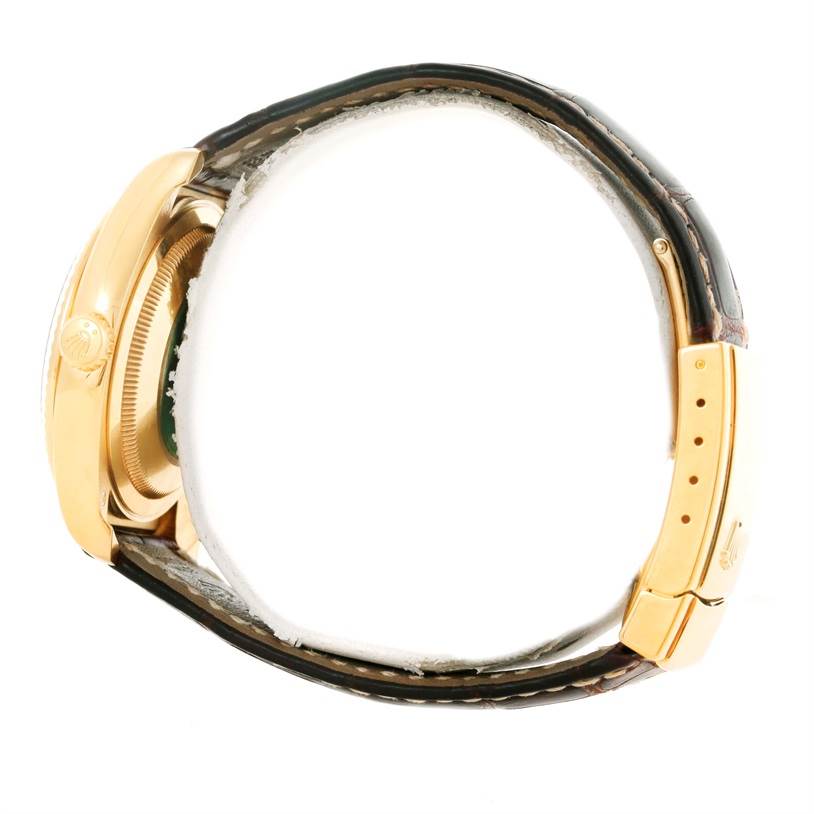 The image shows a side view of a Rolex President 116138 Men's Yellow Gold White Dial 116138 Men's Yellow Gold White Dial model watch, highlighting the case, crown, and leather strap with clasp.