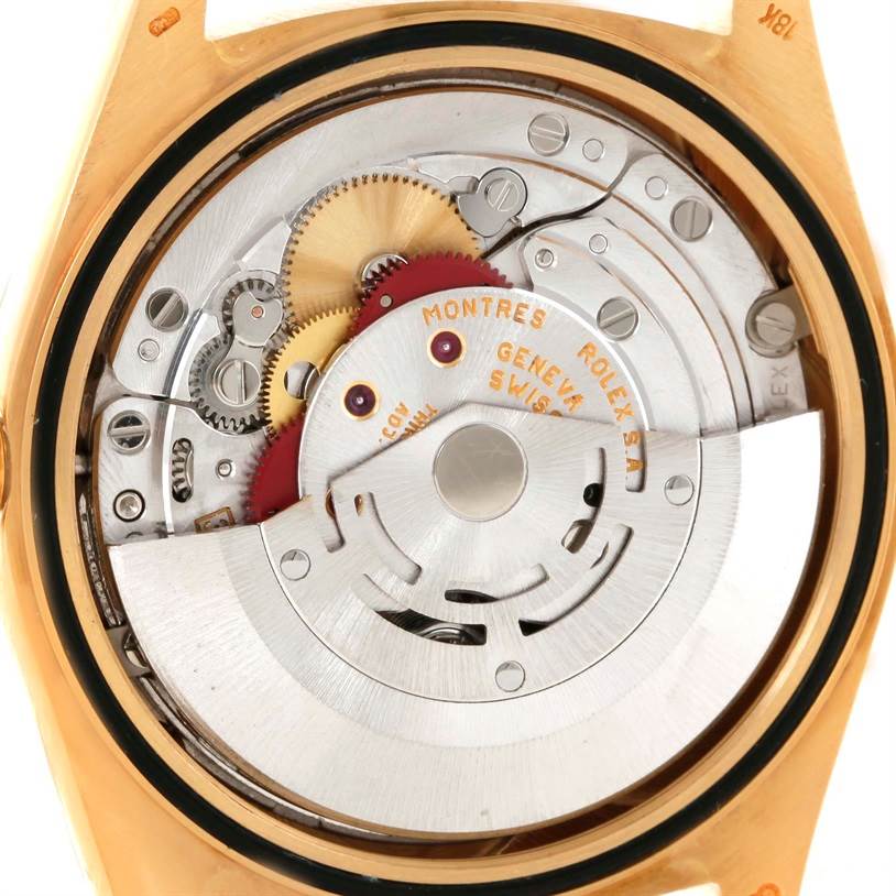 This image shows the intricate inner workings and automatic movement of a Rolex President 18238 Men
s Yellow Gold Champagne Dial 18238 Men
s Yellow Gold Champagne Dial model watch from a rear angle.