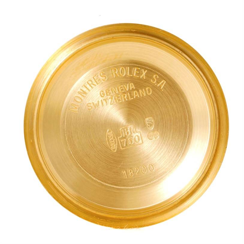 This is the inside case back of a Rolex President 18238 Men
s Yellow Gold Champagne Dial 18238 Men
s Yellow Gold Champagne Dial model watch, shown from a top-down angle.