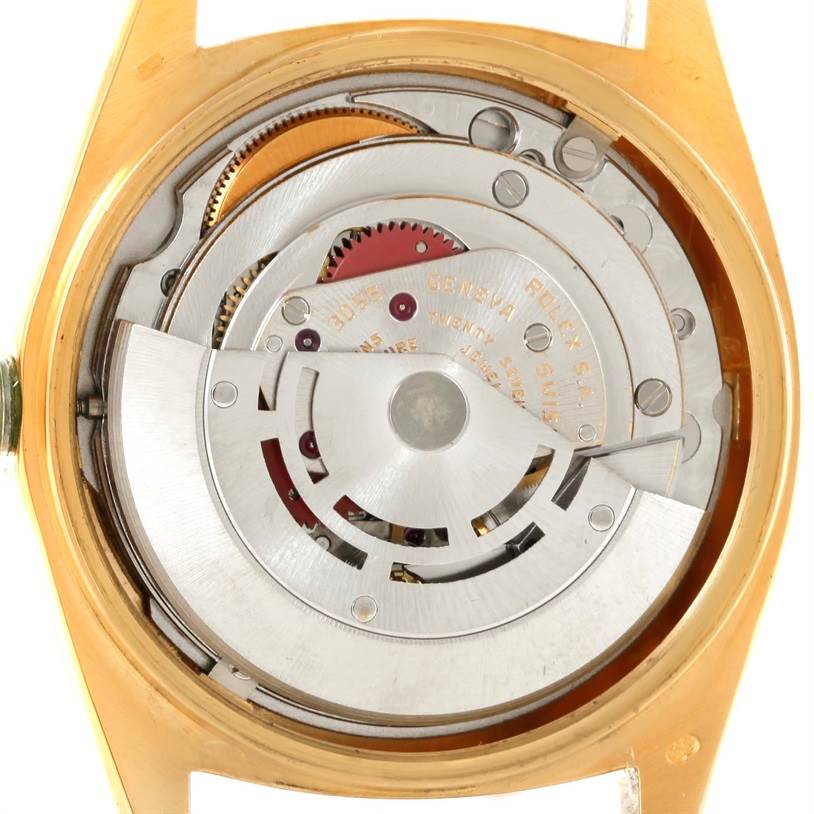 This image shows the movement mechanism of a Rolex President 18078 Yellow Gold Champagne Dial 18078 Yellow Gold Champagne Dial model watch from the back angle, highlighting the intricate gears and components.