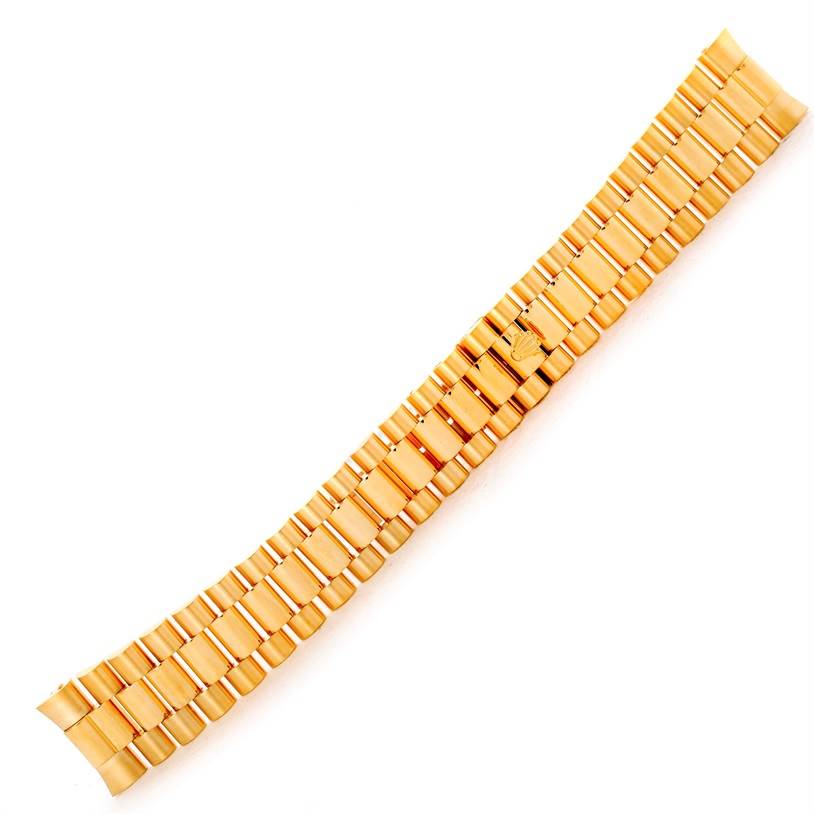 This image shows a gold bracelet strap for the Rolex President Men's  Men's  model watch, viewed from above.