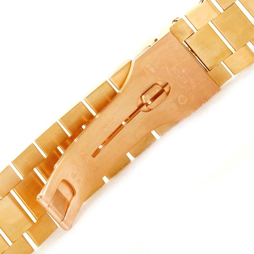 This image shows a close-up of the gold bracelet and clasp of a Rolex President Men's  Men's  model watch from the back angle.