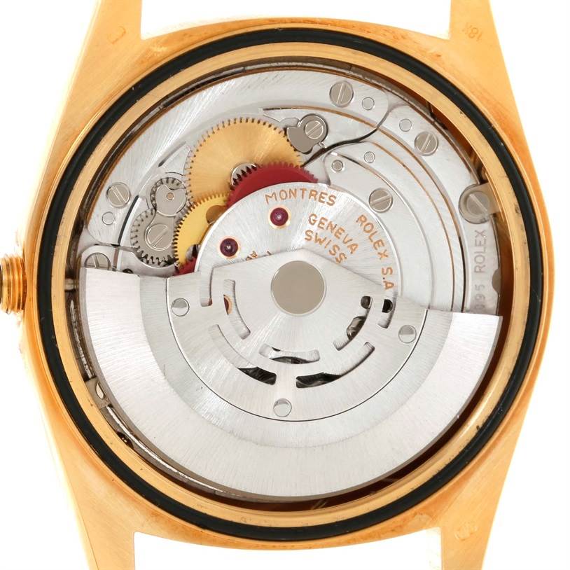 This image shows the exposed inner mechanics of a Rolex President 18238 Men
s Yellow Gold Champagne Dial 18238 Men
s Yellow Gold Champagne Dial model watch from a top-down angle.