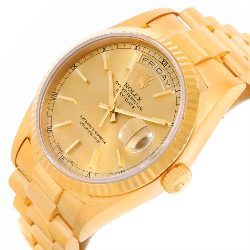 The image shows a close-up angled view of the Rolex President 18238 Men
s Yellow Gold Champagne Dial 18238 Men
s Yellow Gold Champagne Dial model watch showcasing its gold dial, bracelet, and day-date display.