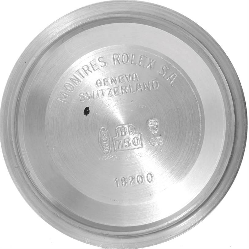 The image shows the inside case back of a Rolex President 18239 Men
s White Gold Silver Dial 18239 Men
s White Gold Silver Dial model watch, displaying various engravings.