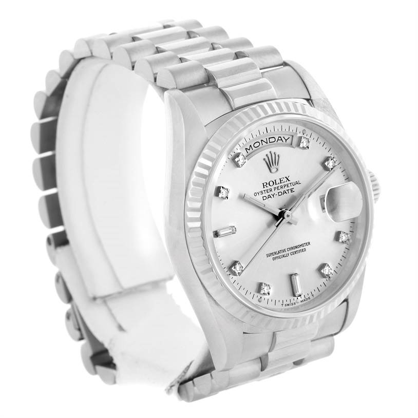 The Rolex President 18239 Men
s White Gold Silver Dial 18239 Men
s White Gold Silver Dial model watch is shown at a three-quarter angle, displaying the face, bezel, bracelet, and part of the clasp.