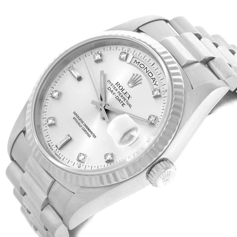 The Rolex President 18239 Men
s White Gold Silver Dial 18239 Men
s White Gold Silver Dial model watch is shown at an angle highlighting the dial, bezel, bracelet, crown, and day-date display.