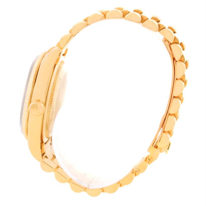 The image shows a side view of a Rolex President 18238 Men's Yellow Gold White Dial 18238 Men's Yellow Gold White Dial model watch, focusing on the edge of the case and the bracelet.