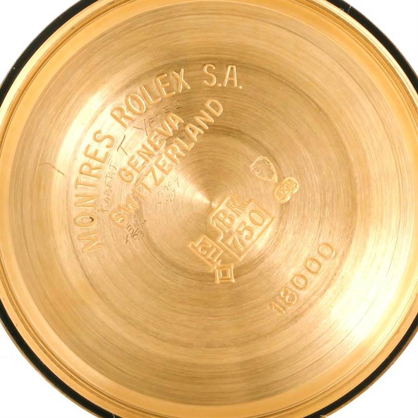 This image shows the inside case back of a Rolex President 18038 Men's Yellow Gold Black Dial 18038 Men's Yellow Gold Black Dial model watch, featuring engravings and hallmarks.