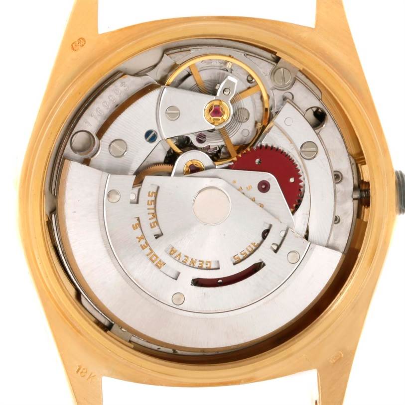 This image shows the movement and internal mechanisms of a Rolex President 18038 Men's Yellow Gold Black Dial 18038 Men's Yellow Gold Black Dial model watch.