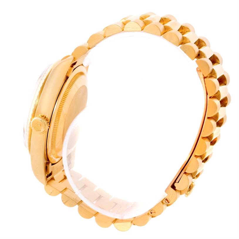 The image displays a side view of the Rolex President 18238 Men's Yellow Gold Champagne Dial 18238 Men's Yellow Gold Champagne Dial model, showing the watch's crown and a segment of the gold bracelet.