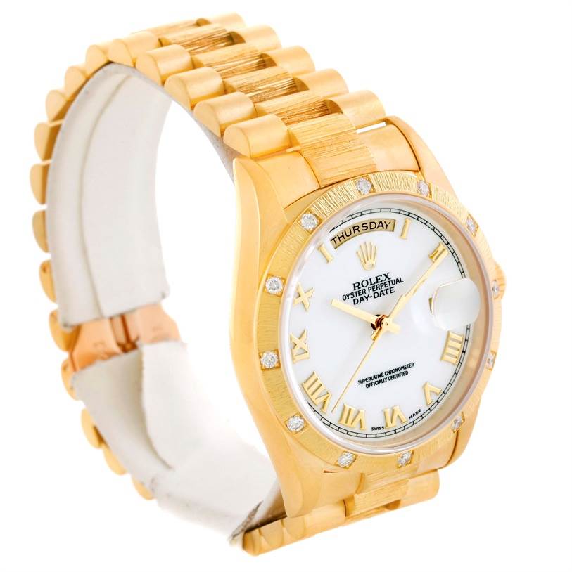 The image shows a side view of a Rolex President 18308 Men's Yellow Gold White Dial 18308 Men's Yellow Gold White Dial model watch, highlighting its gold bracelet, bezel, and white dial.